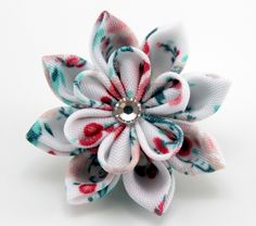 A flower is made in the technique of tsumami kanzashi. Flower is made from satin ribbons . Flower's d ~ 1 inch (2-3 cm). More lapels see here: https://www.etsy.com/shop/JuLVa?section_id=11777522&ref=shopsection_leftnav_4 Avalaible in 6 colors My handworks can be a unique gift for you, your family and friends! For more items, please visit my shop home: http://www.etsy.com/shop/JuLVa Please be aware that orders are sent via standard delivery. Standard delivery from Latvia does not include a tr White Flower Pins As Gifts, White Flower Pins For Gifts, Handmade Flower Pins For Gifts, Flower Shaped Wedding Pins With Flower Decoration, White Flower Pins For Wedding, White Handmade Flowers Lapel Pin For Gifts, White Handmade Flowers Lapel Pin As Gift, Handmade Flower Lapel Pin For Gifts, Elegant Flower Lapel Pin With Decoration