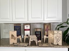 several mail boxes are sitting on a kitchen counter