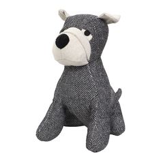 a black and white dog stuffed animal on a white background