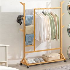 a wooden rack with clothes hanging on it