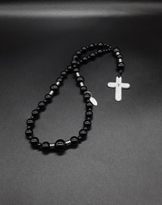 Black Obsidian Necklace With 8mm Beads, Black Gothic Jewelry With 8mm Beads, Black Rosary With 108 Beads As Gift, Gift Black Rosary With 8mm Beads, Black Cross Rosary As Gift, Black Beaded Cross-shaped Rosary, Black Beaded Cross Rosary, Black Spiritual Cross Jewelry, Spiritual Black Cross Jewelry