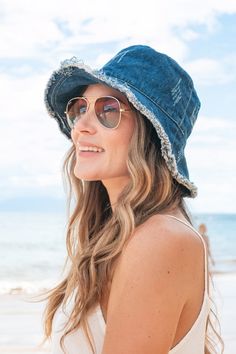 Head out in style with our denim bucket hats! Featuring a frayed edge and washed design, these are guaranteed to keep you ahead of the trend! Details:Trending Bucket Hat styleWashed DenimFrayed EdgesInternal Wire Brim for Perfect StylingOne Size Fits Teen-Adult Summer Denim Hat In Medium Wash, Denim Bucket Hat For Summer, Denim Blue Beach Hat With Short Brim, Denim Blue Beach Hat With Curved Brim, Summer Washed Blue Denim Hat, Summer Denim Bucket Hat With Curved Brim, Short Brim Denim Bucket Hat For Beach, Beach Hat With Curved Brim In Denim Blue, Denim Bucket Hat With Short Brim For Beach