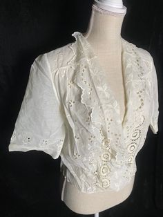 "Beautiful late 1800's/early 1900's semi sheer cotton blouse with eyelet. Has half sleeves and a single waist snap for a closure. Has notable underarm stains and one other faint stain - all shown in photos Women's large 42\" max bust 32\" waist 20\" shoulder to hem" Rain Bonnet, Underarm Stains, Eyelet Blouse, Blue Party Dress, Goddess Dress, Blue Party, Cotton Blouse, Antique White, Cotton Blouses