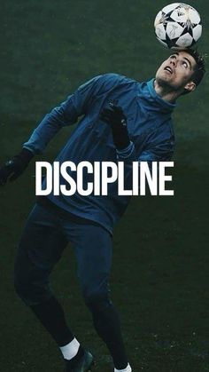 a man is playing with a soccer ball on his head and the words discipline above him