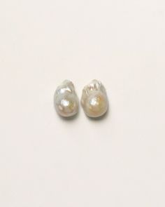 DETAILS: 1 inch baroque pearls Made with Gold plated Stainless steel posts At Vivian Drew, we use natural stones in our designs. Natural stones are a product of nature and may have slight variations in color, pattern, and texture. We think that variations are beautiful & make each piece unique. Single Baroque Pearl Earring As Gift, White Baroque Pearl Jewelry With Natural Stones, Gold Baroque Pearl Earrings Gift, Delicate Gold Baroque Pearl Earrings, Baroque Pearl Stud Earrings, 30 Gifts, Gift Card Sale, Gift Card Shop, Pearl Studs