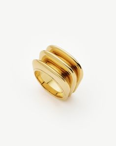 This standout ring features triple domed ridge detailing, for the look of three rings in one. Wear this statement style solo or contrast with more delicate stacking styles. Metal: 18k Recycled Gold Plating on Brass Ring Dimensions: 5.4mm x 15.5mm Weight: 18g Product Code: FR-G-R3-NS Solid Gold Bracelet, Trending Bracelets, Silver Ring Designs, Trending Necklaces, Ring Trends, Mixed Metal Jewelry, Coin Pendant Necklace, Solid Gold Necklace, Earring Trends