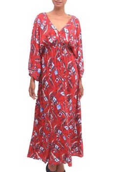 Displaying lovely floral motifs printed over a body of strawberry red this caftan is designed by Bali's Ratu and Devi. Crafted from rayon this lovely caftan features a V neck with a tie closure on the back with long sleeves and a maxi skirt. Bouquet Strawberry, Strawberry Bouquet, Urban Threads, Empire Waist Dress, Women Artisans, Design Patterns, Pattern Drawing, Floral Motifs, Waist Dress