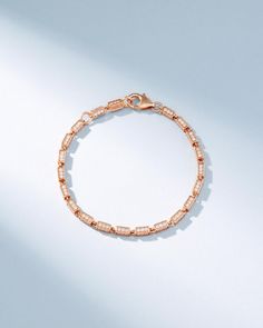 Crafted with 18-karat gold, this block-chain bracelet presents a symphony of four-sided links set with pave white diamonds. The medium, block-chains add a contemporary edge to the timeless design making it perfect for casual or evening wear. Details 18k yellow gold, rose gold or white gold 2.90 carats of pave white diamonds on 7" bracelet 7" inch bracelet is adjustable at 6.5" inches 3.45 carats of pave white diamonds on 8" bracelet 8" inch bracelet is adjustable at 7.5" inches 2.8mm link thickn Luxury Rose Gold Chain Link Bracelets, Elegant Diamond Cut Link Chain Bracelet, Luxury Rose Gold Bracelet With Rectangular Links, Fine Jewelry Bracelets With Rectangular Chain Links, Luxury Rose Gold Link Bracelets, Fine Jewelry Rose Gold Cubic Zirconia Chain Bracelet, Rose Gold Cubic Zirconia Chain Bracelet Fine Jewelry, Rose Gold Jubilee Chain Bracelet With Rectangular Links, Classic Rose Gold Box Chain Bracelet