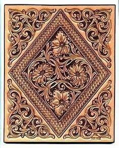 an intricately designed copper tile with flowers and leaves on the center, is shown