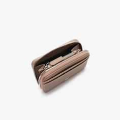 This elegant, ergonomic Daily City billfold is made from hard-wearing canvas and has room for all your daily essentials. With compartments for cards, transport passes, bills and coins. A practical design to slip into a bag or pocket. Functional Everyday Bifold Wallet, Beige Wallet With Coin Pocket For Daily Use, Beige Travel Coin Purse With Coin Pocket, Functional Trifold Wallet With Interior Card Slots, Modern Beige Wallets For Daily Use, Beige Everyday Coin Purse, Travel Bifold Coin Purse With Rfid Blocking, Travel Bifold Coin Purse With Interior Card Slots, Bifold Coin Purse With Rfid Blocking For Travel