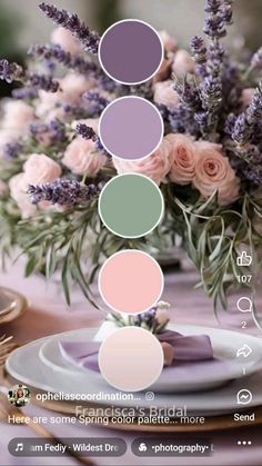 a table topped with plates and vases filled with flowers