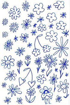 blue flowers and leaves drawn on white paper