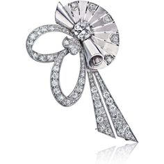 Presenting the exquisite Raymond C. Yard 1940's Platinum Retro Diamond Fan Clip Brooch, a true gem that embodies elegance and sophistication. This brooch is a delightful accessory that radiates charm and personality. Adorned with an enchanting array of diamonds, it captivates the eye and adds a touch of sparkle to any ensemble.Crafted with meticulous attention to detail, this brooch features a full-cut diamond at its center, weighing approximately 0.65 carat, surrounded by a stunning collection Extraordinary Jewelry, Ribbon Flower, Antique Brooches, Platinum Metal, Fine Jewels, Ribbon Flowers, Gia Certified Diamonds, Round Cut Diamond, Estate Jewelry