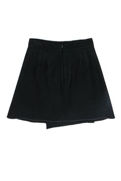 Go bold and a bit refined with this classic wool blend skirt from Carven! Perfect for wearing with turtlenecks, crisp blouses and your favorite loafers, this asymmetric beauty is a daytime sophisticated piece that is sure to be your newest preppy staple. Size 8 (FR 40) 80% Wool, 20% Polyamide A-line silhouette Asymmetric draped design Single exterior pocket Fully lined Zippered back Waist 30" Total length 22" Elegant Formal Skirt With Asymmetrical Hem, Formal Asymmetrical Lined Bottoms, Elegant Formal Bottoms With Asymmetrical Hem, Chic A-line Wool Bottoms, Elegant Bottoms With Asymmetrical Hem For Formal Events, Fitted Asymmetrical Skirt For Work, Fitted Skirt For Workwear With Asymmetrical Hem, Formal Lined Skirt With Asymmetrical Hem, Asymmetrical Black Mini Skirt For Work