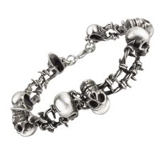 Step into the world of gothic gothic with this unique no man's land bracelet. Crafted from genuine pewter, this unique bracelet is perfect for embracing your inner gothic. Whether you're looking for a subtle piece of jewelry or a statement piece, this bracelet is sure to make a statement. It's perfect for everyday wear or for special occasions. With its timeless style, this bracelet is the perfect addition to any outfit, and a great gift for someone special. So, embrace your inner gothic and add this unique bracelet to your collection today! emerging from the bottomless mud and gore of the fields of passchendaele, the detritus of humanity and war blossom. Alchemy Gothic Jewelry, No Man's Land, Gothic Bracelet, Biker Jewelry, Skull Bracelet, Skull Jewelry, Barbed Wire, Unisex Bracelets, Wire Bracelet