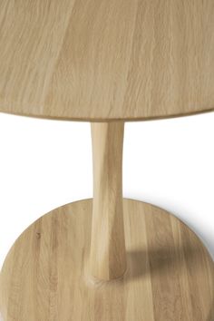 a close up of a wooden table on a white background