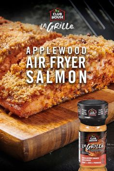 an advertisement for applewood air fryer salmon on a cutting board with seasoning