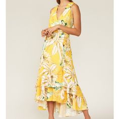 Woven And Wool Material V-Shaped Neckline Functional Warp With Spaghetti Ties Circular Cut Ruffle At The Bottom Yellow Casual Maxi Dress With Tropical Print, Casual Yellow Maxi Dress With Tropical Print, Tropical Yellow V-neck Maxi Dress, Yellow Tropical V-neck Maxi Dress, Yellow Tropical Print Maxi Dress, Chic Lemon Print Dress For Vacation, Yellow Maxi Dress With Tropical Print, Tropical Yellow Dress For Brunch, Yellow Tropical Dress For Brunch