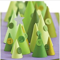 paper trees with numbers and stars on them