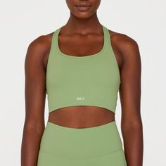 Limited Edition Grow Set Active Sportbody Top Size Small Brand New Never Worn Limited Drop And Not Sold Anymore - For Actual Color See Model Images; Photographed Darker Bundle With Biker Shorts And I’ll Give You A Deal Green Fitted Sports Bra With Scoop Neck, Fitted Green Sports Bra With Scoop Neck, Green Fitted Scoop Neck Sports Bra, Fitted Green Sports Bra For Spring, Green Compressive Bra-friendly Top, Green Medium Support Bra Friendly Top, Set Active, Model Images, Pleated Jacket