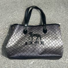 Large Oversized Tote Bag With L.A.M.B. Logo On Front. From Gwen Stefani’s Label. Striped Interior. Very Good Pre-Owned Condition. Some Wear On Straps And Some Discoloration On Back Where Strap Handles Are. Should Be Able To Be Cleaned. Luxury Gray Shoulder Bag With Dust Bag, Designer Gray Tote Bag, Luxury Gray Shoulder Bag With Double Handle, Designer Gray Bags For Daily Use, Designer Gray Bags, Luxury Gray Bags With Leather Handles, Luxury Gray Shoulder Bag With Leather Handles, Chic Gray Shoulder Bag With Dust Bag, Designer Gray Bag With Branded Hardware