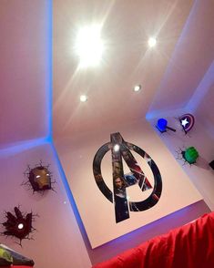 the ceiling is decorated with many different types of decorations and lights, including an iron man symbol