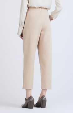 Rivet, feather-edge belt loops and patch pockets define these utilitarian pants featuring an ankle-cropped length cut from a supersoft cotton-based blend. Zip fly with double button closure 51% cotton, 49% tencel Dry clean Imported High-waisted Workwear Bottoms With Flap Pockets, High-waisted Pants With Flap Pockets For Work, Solid Cropped Workwear Pants, Solid Color Cropped Leg Work Pants, Solid Cropped Leg Work Pants, Solid Color Cropped Pants For Workwear, Solid Cropped Pants For Work, Spring Utility Cargo Pants For Workwear, Utility Cargo Pants For Spring Workwear