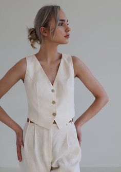 Linen vest Kelsey 4 Chic Fitted Linen Tank Top, Fitted Linen Tank Top For Spring, Elegant Linen Tank Top For Work, Elegant Linen Tank Top For Spring, Beige Linen Spring Vest, V-neck Linen Vest For Summer, V-neck Linen Summer Vest, Fitted Sleeveless Linen Vest, Chic Summer Linen Vest