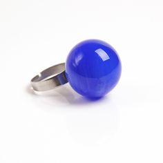 This joyful statement Blue ball ring can be a shining addition to your outfit or simply a unique note, matching your mood and individuality! Dimensions: the ring is adjustable. The bead is 20-22mm (about 0.8-0.9 inch) in diameter. Materials: artist lampwork bead, hypoallergenic stainless steel ring band. Colors used: blue. Please, note, each bead is made by hand and may differ slightly. All the photos that are represented in the item description, are images of different items, made at different Nickel Free Adjustable Rings For Parties, Adjustable Nickel-free Rings For Party, Trendy Blue Ring For Parties, Trendy Blue Party Ring, Clear Bracelet, Bubble Ring, Glass Bubble, Blue Ball, Cool Gifts For Women