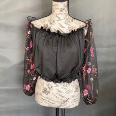 Shein Long Sleeve Off Shoulder Crop Top. Sleeves Are Sheer No Tags Was Ordered Online Black Floral Print Party Tops, Black Crop Top Blouse For Spring, Chic Black Tops With Floral Embroidery, Black Tops With Floral Embroidery For Night Out, Black Top With Floral Embroidery For Night Out, Spring Night Out Blouse With Floral Embroidery, Spring Floral Embroidered Blouse For Night Out, Black Blouse For Spring, Trendy Black Tops With Floral Embroidery