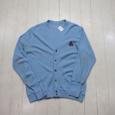 1980s/1990s Izod Baby Blue Knit Cardigan Sweater Size M/L condition - good - light discolouration  tagged - no tag - fits M/L approx - please consult measurements  22" pit to pit  26" length 25" sleeve length  Please contact us if you have more questions about this garment. 90s Style Blue Cotton Sweater, Retro Blue Long Sleeve Cardigan, Blue Retro Long Sleeve Cardigan, Blue Knit Cardigan, Vintage Cotton V-neck Outerwear, Blue Long Sleeve Vintage Cardigan, Vintage Blue Cotton Cardigan, Blue Vintage Button-up Cardigan, 90s Blue Cotton Sweater