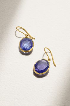 Pippa Small's jewelry is crafted by artisans from across the globe - these earrings were hand-carved at a small workshop in Sanganer, India. They're cast from 18-karat gold and set with faceted tanzanite stones, which move gently with every step. Luxury Round Tanzanite Earrings, Tanzanite Teardrop Earrings As A Gift, Yellow Gold Tanzanite Jewelry With Matching Earrings, Fine Jewelry Tanzanite Earrings For Gift, Tanzanite Round Earrings As Gifts, Round Tanzanite Earrings Gift, Round Tanzanite Earrings For Gifts, Artisan Polished Earrings For Gift, Oval Tanzanite Gemstone Earrings