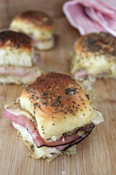 ham and cheese sliders on a cutting board