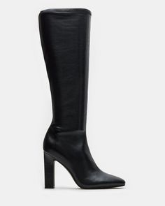 Elevate your style with our ARIA knee-high heeled boot. Crafted with a sleek design, these boots will add a touch of sophistication to any outfit. You can confidently step out in style with a comfortable heel height and secure fit. Perfect for any fashion-forward individual. 4 inch heel height Size 6 measurements: 13.5 inch shaft circumference, 14.5 inch shaft height Size 8 measurements: 14 inch shaft circumference, 15.75 inch shaft height Size 10 measurements: 15 inch shaft circumference, 16.5 inch shaft height Vegan leather upper material Textile lining Vegan leather sock Synthetic sole Imported Heel Boot Outfits, Black Heel Boots Outfit, Baddie Business, Heels Boots Outfit, High Heel Boots Knee, Black Knee High Boots, Black Boots Tall, Black Heel Boots, Black Chelsea Boots