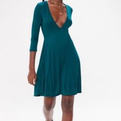 Uo Mercer Plunging Mini Dress - Nwt - Soft Knit - Plunging Deep V- Neckline - Empire Waistline - Trimmed With 3/4 Sleeves - Side Seam Pockets - Color: Green - Size: Xs Flattering V-neck Midi Dress For Fall, Green V-neck Dress By Urban Outfitters, Urban Outfitters Green V-neck Dress, Fitted V-neck Mini Dress By Urban Outfitters, Urban Outfitters Fitted V-neck Mini Dress, Green V-neck Dress From Urban Outfitters, Flattering V-neck Mini Dress For Spring, Chic Knee-length Midi Dress By Urban Outfitters, Chic V-neck Midi Dress By Urban Outfitters