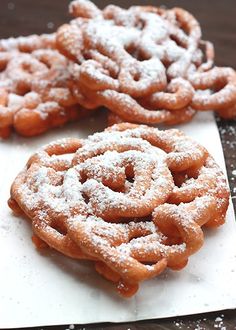 three different types of powdered sugar cookies