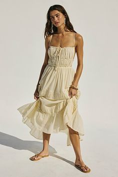 Just as effortless as it is versatile, this wear-everywhere maxi from our free-est collection is featured in a billowy, tiered silhouette with smocked detailing at the bodice and front tie detailing for added dimension. * Open back design * Adjustable, tie-back style * Lined | Taking Sides Maxi Dress by free-est at Free People in White, Size: L Italy Outfits, Style Maxi Dress, Senior Pics, Fashion 2024, Tie Dress, Glamorous Evening Gowns, Flowing Maxi Dress, Back Design, Boho Outfits