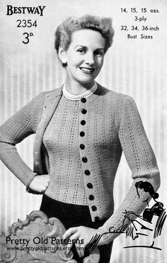 a woman wearing a sweater with buttons on the front and back, standing next to a chair