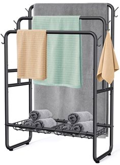 a towel rack with towels hanging on it