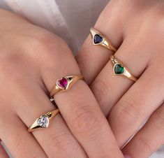 Our heart rings are made of 14k solid gold and its available in four different gem color options; white zircon, blue zircon, green zircon, and pink zircon. All the rings are very charming with heart-shaped zircon stones. They fit your all outfit at any time of the day. It has cute, dainty, and minimalist style that will be your favorite ring! If you consider these gold heart signet rings as a gift for special days, they can be an excellent present for your loved ones on their birthdays, valentin Heart Ring Gold, Heart Signet Ring, Pink Zircon, Heart Rings, Gold Heart Ring, Signet Rings, Dope Jewelry, Gem Ring, Ring Minimalist