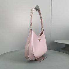 SHOP MORE LUXURY PRODUCTS HERE Description Prada Cleo Brushed Shoulder Bag Pink For Women, Women’s Bags 11.8in/30cm The Prada Cleo bag with sophisticated allure reinterprets an iconic design of the brand from the nineties. The sleek, curved lines emphasized by the particular sloped construction of the bottom and sides give this hobo bag a soft, light look. Brushed a distinctive element of Prada collections, is a modern and versatile material that lends itself to always new combinations and Luxury Pink Baguette Bag For Shopping, Designer Pink Baguette Shoulder Bag, Designer Pink Baguette Bag For Daily Use, Designer Pink Baguette Bag With Detachable Handle, Designer Pink Satchel Baguette Bag, Pink Baguette Bag With Dust Bag, High-end Pink Shoulder Bag, Designer Double Handle Baguette Bag, Luxury Pink Baguette Bag For Everyday