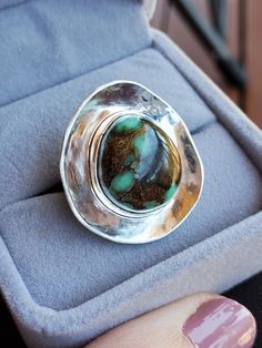 "The Dinosaur Egg Ring.  One of a kind sterling silver ring with natural turquoise set in the center of a shining silver \"nest\"" Silver Turquoise Cabochon Ring, Silver Turquoise Ring With Cabochon, Silver-setting Turquoise Cabochon Ring, Sterling Silver Turquoise Ring With Large Stone, Silver Turquoise Ring With Bezel Setting, Artisan Silver Turquoise Ring With Large Stone, Artisan Turquoise Ring With Large Silver Stone, Untreated Silver Turquoise Ring, Unique Silver Turquoise Ring