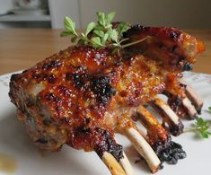 there is a piece of meat on a plate with toothpicks and parsley