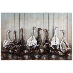 four geese are standing in front of a wooden wall