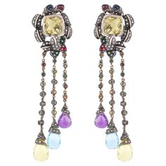 An extraordinary blend of artistry and elegance, the 29.34 Carat Diamond and Mixed Stones Chandelier Earrings bring together an intricate array of precious gemstones to create a design that is as captivating as it is refined. With an expert balance of color and brilliance, these chandelier earrings are designed to offer a dramatic yet sophisticated aesthetic. The 29.34 carats of finely cut diamonds cascade gracefully throughout the earrings, with each facet precisely angled to capture and reflect light. The chandelier structure adds an ethereal quality, as the diamonds catch every glimmer, creating a dazzling effect with every movement. Interwoven among the diamonds, a collection of carefully selected mixed stones introduces a dynamic layer of texture and color. These gemstones provide a c Fine Jewelry Collection, Precious Gemstones, Chandelier Earrings, Diamond Cuts, Fine Jewelry, Jewelry Earrings, Diamonds, Gems, Gemstones