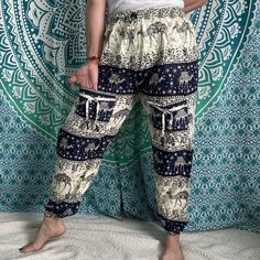 Thai Drawstring two pocket Harem Pants Waist: 23" - 46Hip: 50"Lenght: 43"Inseam: 28"Pockets: twoWeight: 170g Bohemian Summer Cargo Pants With Pockets, Bohemian Bottoms With Tapered Leg And Pockets, Bohemian Bottoms With Pockets And Tapered Legs, Bohemian Tapered Leg Bottoms With Pockets, Bohemian Lounge Pants With Pockets, Bohemian Loungewear Pants With Pockets, Bohemian Long Pants With Side Pockets, Bohemian Harem Pants With Pockets And Tapered Leg, Blue Cargo Lounge Bottoms