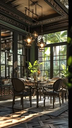 an elegant dining room with large windows and chandelier