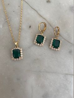 Gold-plated huggie hoop earrings measuring 1.2 cm x 1.4 cm with a rectangle emerald green jewel and crystal charms measuring 1.3 cm x 1.6 cm. Comes in a pair and the base metal is brass. Comes in a black velvet pouch. If this is a gift and you would like a box free of charge please mark as a gift or leave a note at checkout. Matching necklace available here...https://www.etsy.com/uk/listing/1179610652/gold-crystal-emerald-green-rectangle?ref=listing_published_alert INTERNATIONAL BUYERS please ch Luxury Green Onyx Jewelry For Gift, Emerald Green Earrings Wedding, Emerald And Gold Jewelry Set, Green And Gold Accessories, Emerald Bridal Jewelry, Gold And Emerald Earrings, Emerald Earrings Outfit, Emerald Green And Gold Jewelry, Emerald Green Accessories