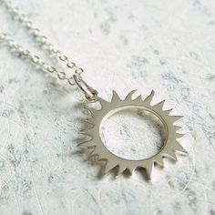 The metaphorical significance of a solar eclipse--the temporary darkening of illumination--can invite deep, meaningful reflection on the rich dance of dark and light in our daily lives. It is this tension between light and dark, joy and pain, loss and rebirth, that gives life it's beautiful poignancy. The Eclipse Necklace is a wonderful reminder of this emotional dichotomy, and the rare times we are able to witness this phenomenon. Sterling silver charm on 18" sterling chain. Bronze charm on 18" 24k gold plated chain. Sun Eclipse, Eclipse Necklace, Necklace Sun, Spring Bracelet, Sun Necklace, The Eclipse, Stretchy Bracelets, Solar Eclipse, Gold Plated Chains