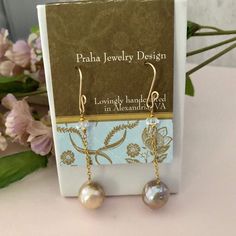 Stunning earrings worthy of your special day. These beauties are elegant in their simplicity. You'll want to wear them every chance you get. Perfect for a wedding or a special occasion. The earrings measure 64mm, or just over 3". Description: Stunning bronze metallic Baroque freshwater pearls descend from 14K GF chain and white topaz rondells. All 14K GF components, including GF handcrafted ear wires. Baroque Wedding, Baroque Pearl Earrings, Pearl Earrings Dangle, Stunning Earrings, Baroque Pearls, White Topaz, Wedding Earrings, Bridal Earrings, Long Earrings